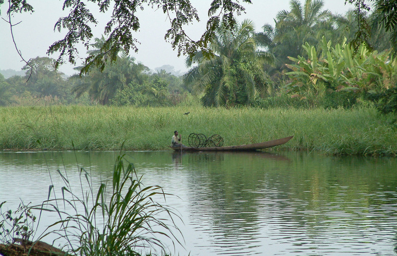 Fisherman on a canoe